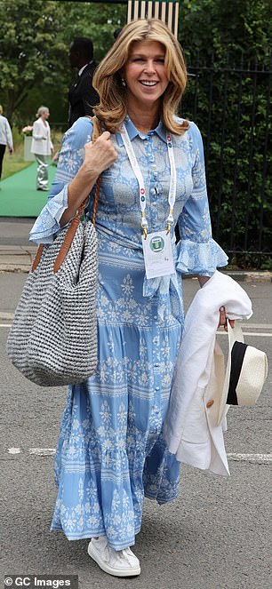 She added stylish pearl earrings and finished it off with comfortable white sneakers