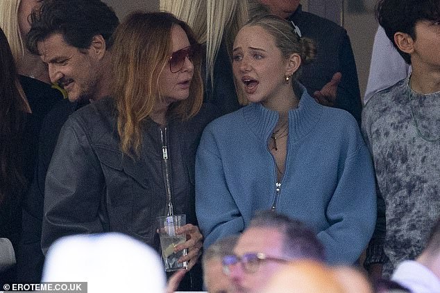 Stella McCartney (right) was also spotted at the star-studded event, where she stepped out in a sleek, slicked-back bun and a blue zip-up sweater.