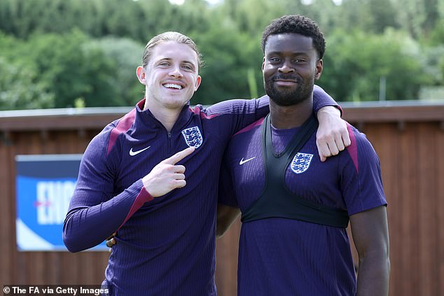 Conor Gallagher pictured pointing to Marc Guehi, who celebrated his birthday on Saturday