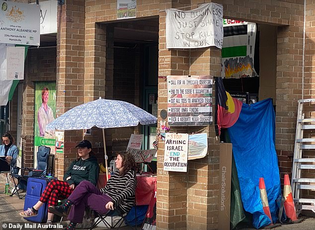 Pro-Palestine protesters have put up signs outside the Prime Minister's electoral office in Marrickville, in Sydney's inner west. It is closed, but he will not persuade protesters to reopen it.