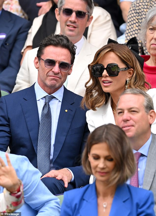 Pictured: Hugh Jackman and Kate Beckinsale on the side of Centre Court on Saturday