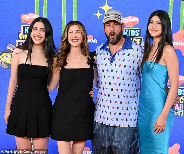 The family showed off their big smiles on the red carpet