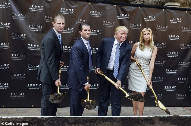 Eric Trump, Donald Trump Jr., Donald Trump and Ivanka Trump attend the groundbreaking ceremony for the Trump International Hotel in Washington, DC at the Old Post Office on July 23, 2014 in Washington, DC