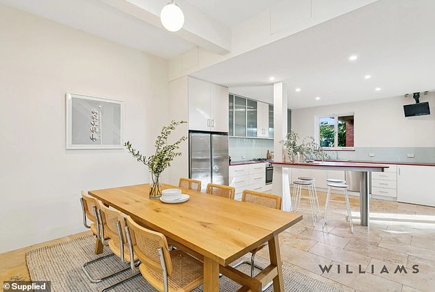 The dining room flows easily into the kitchen and is ideal for entertaining guests