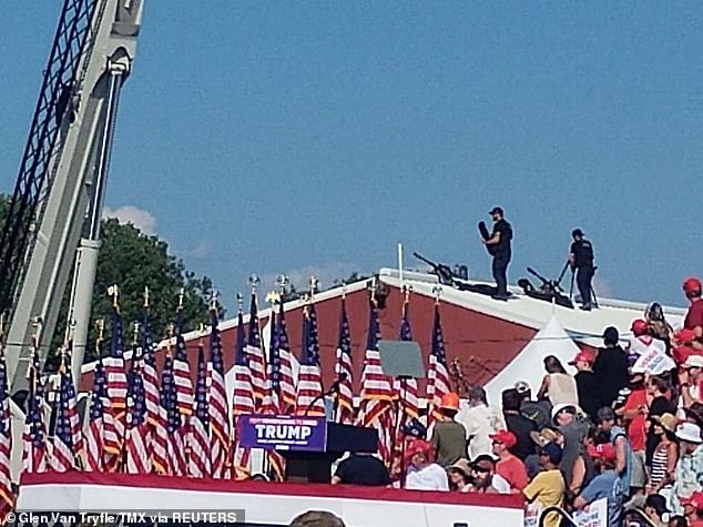 Snippers stand on a roof at Republican presidential candidate and former U.S. President Donald Trump's campaign rally in Butler