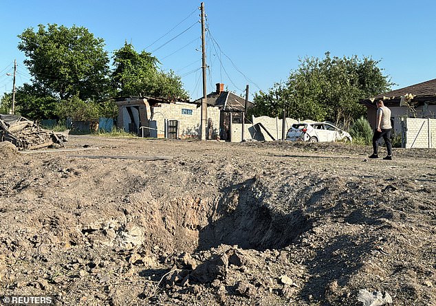 A view of the site of a Russian missile attack, during the Russian attack on Ukraine, in the village of Budj, Kharkiv region