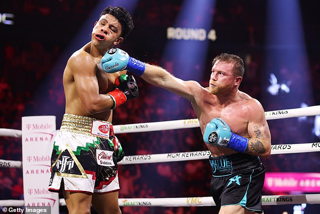 Canelo Alvarez throws a punch at Jaime Munguia during his May 4 victory in Las Vegas