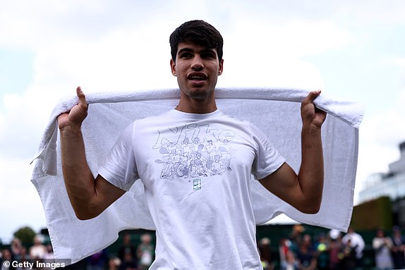 LONDON, ENGLAND - JULY 14: Carlos Alcaraz of Spain looks on as he practices on Court 14 in preparation for the Men's Singles Final against Novak Djokovic of Serbia during Day 14 of The Championships Wimbledon 2024 at the All England Lawn Tennis and Croquet Club on July 14, 2024 in London, England. (Photo by Francois Nel/Getty Images)