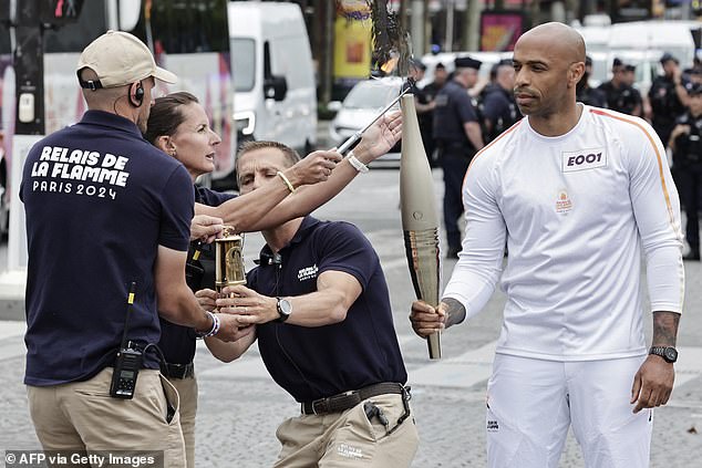 Henry was dressed all in white at the event, which took place amid festivities surrounding France's national day.