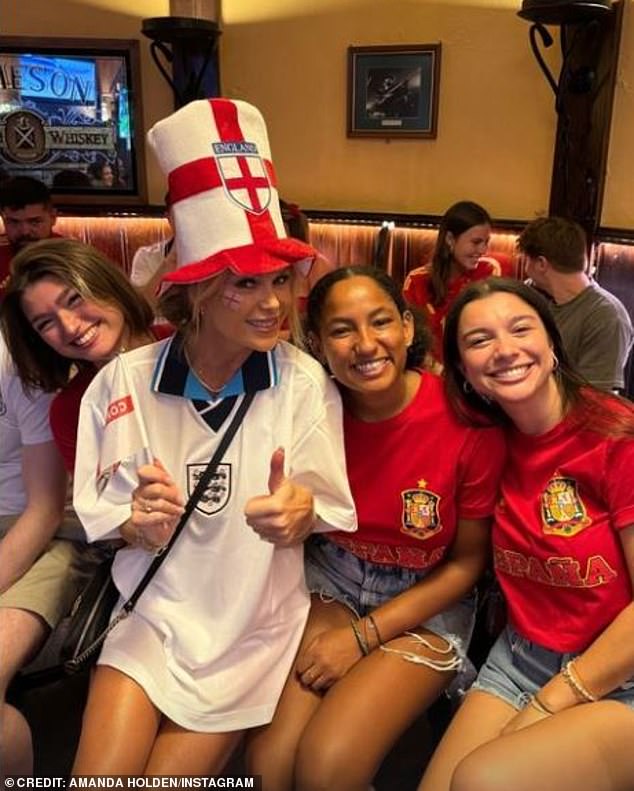 Joined by a group of celebrities cheering on the Three Lions, Amanda cheered on the boys from afar with Spanish rivals