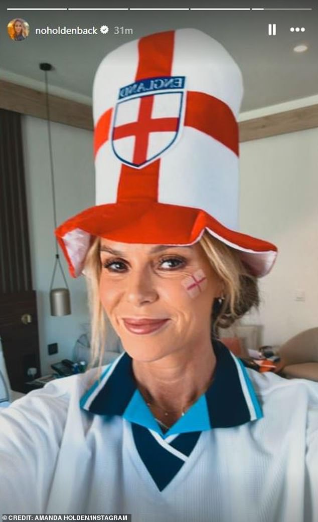 The BGT judge and radio presenter was in high spirits as she sang 'It's Coming Home' while sporting an English face tattoo