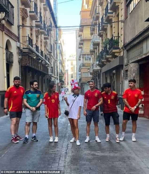 At one point in the video, Amanda skips next to Spanish pillars outside a picturesque street in Europe