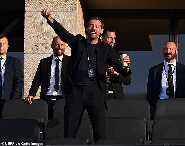 Martin and Roman led the stars of the match, along with former footballer Peter Crouch (pictured), who threw his arms in the air as he patiently waited for kick-off.