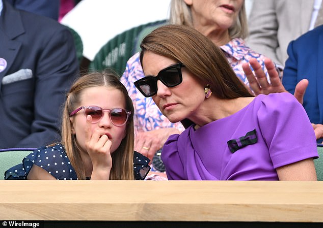 Charlotte looked chic in a £70 Guess polka dot dress and £90 pink Ray Ban sunglasses