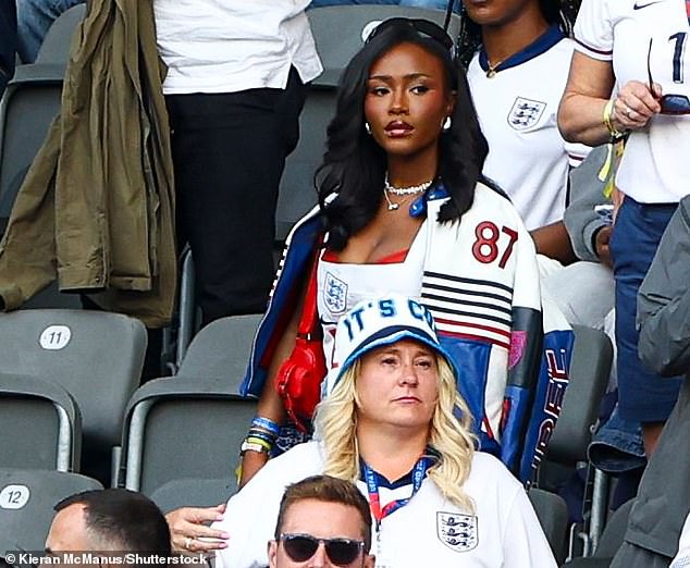 Pictured: Bukayo Saka's girlfriend Tolami Benson looked pensive as she took her seat in the stands