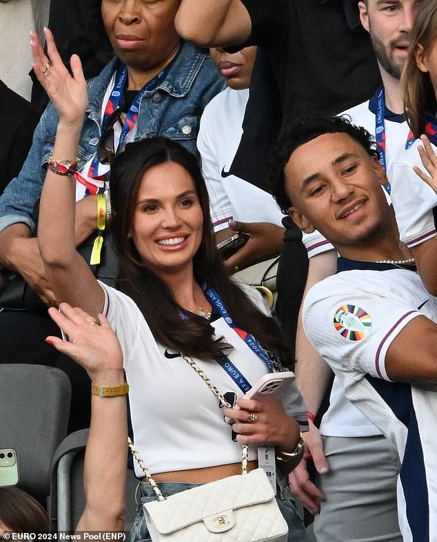 Pictured: Ellie Anderson - Ollie Watkins' girlfriend - and Jordan Watkins in the stands in Berlin