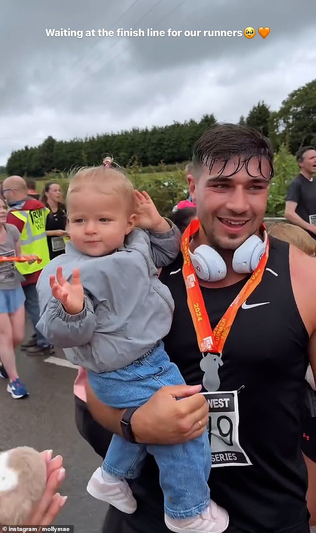 Earlier in the day, Molly-Mae and daughter Bambi, 19 months, supported Tommy Fury during his 10km run