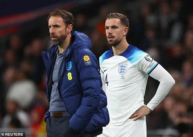 Henderson has not been included in the latest England squad named by Gareth Southgate (left)