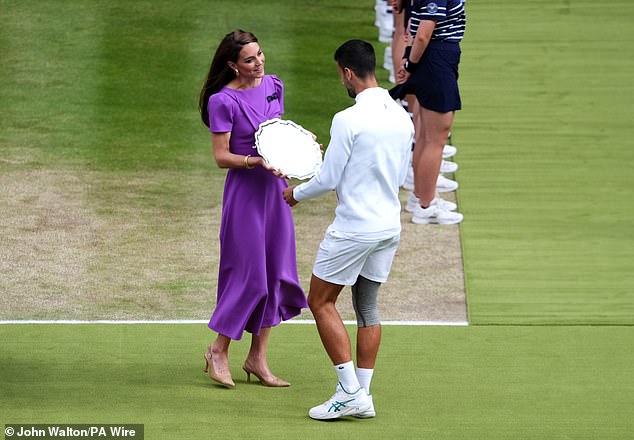 The heavy crepe of the full skirt ensured that not a crease was visible when the princess entered court to present the trophies