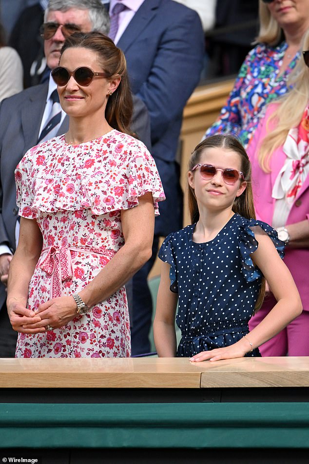 Pip from the old block: Kate's sister looked every bit the devoted aunt next to Princess Charlotte