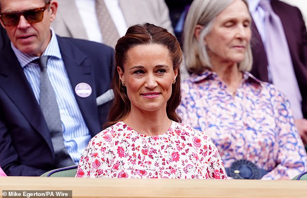 Pretty in pink: Pippa was effortlessly chic as she appeared in the royal box for the men's final