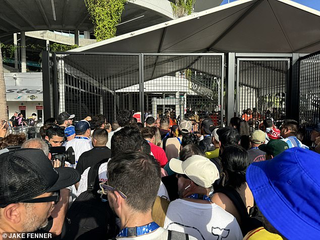 Fans forced open the front gates before flooding onto the Hard Rock Stadium grounds