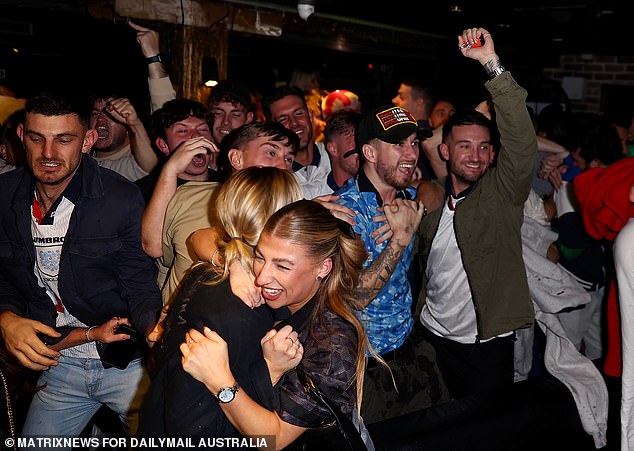 Hundreds of expats braved the cold early morning on Monday to cheer on England - but their hopes were dashed just minutes after this photo was taken