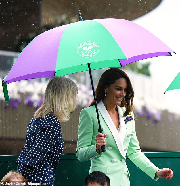 Kate Middleton was photographed last year with the bow and an umbrella to watch a rainy game