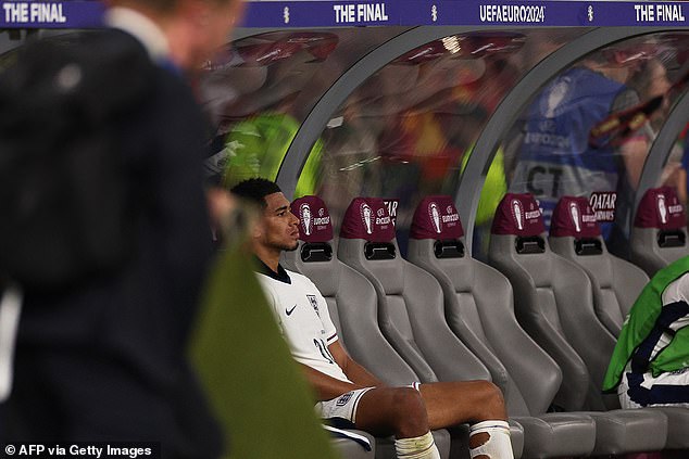 An angry Bellingham looked pensive on the bench as the Spanish players celebrated on the pitch