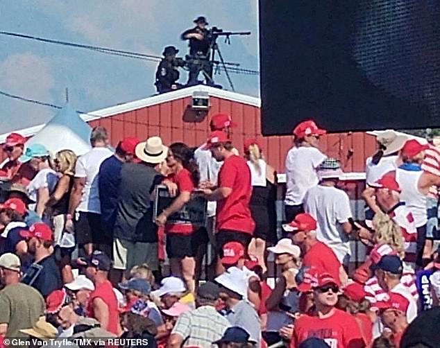 Participants in the protest said they saw the gunman climb onto the roof