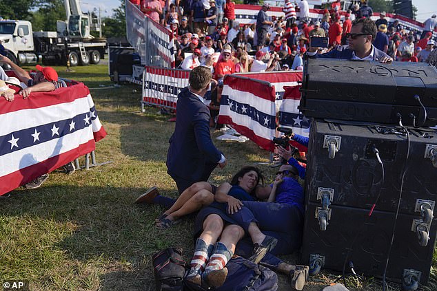 Rally participants took cover as Crooks opened fire from a nearby rooftop on Saturday