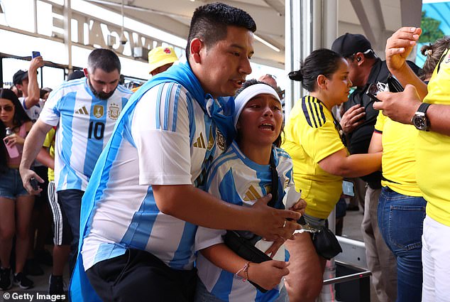 Panicked fans try to enter Hard Rock Stadium in Miami on Sunday amid chaos