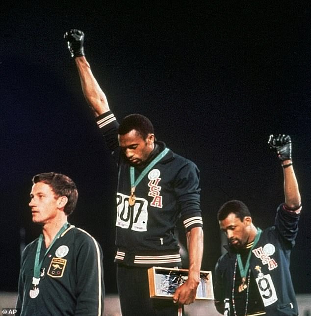 The author expressed concern that the ex-president's raised fist gesture would appeal to black voters, as he associated it with the Black Power protests of American athletes Tommie Smith and John Carlos