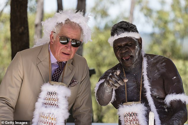 King Charles talks to an indigenous elder during a traditional Welcoming Ceremony in the Country on April 9, 2018