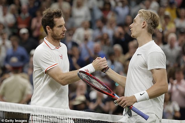 Andy Murray shakes hands after his record defeat to Denis Shapovalov during the fifth day of Wimbledon, July 2, 2021