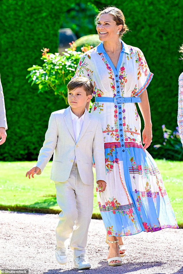 The couple's youngest son, Prince Oscar, eight, wore a white suit but kept his comfy trainers on!