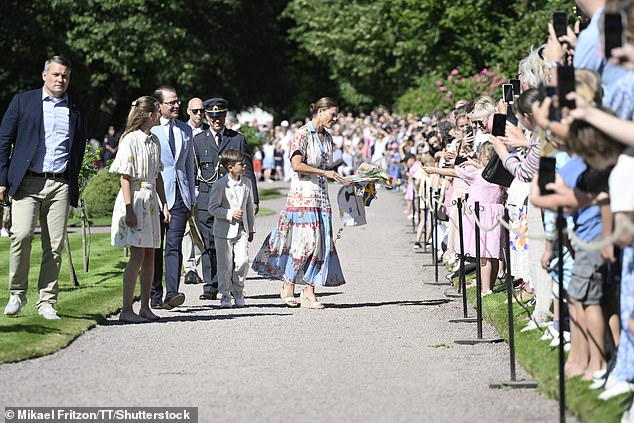 The next few days are staged in her name - known as 'Victoria Days' - and are celebrated across the country. The pictures show the crowds being greeted