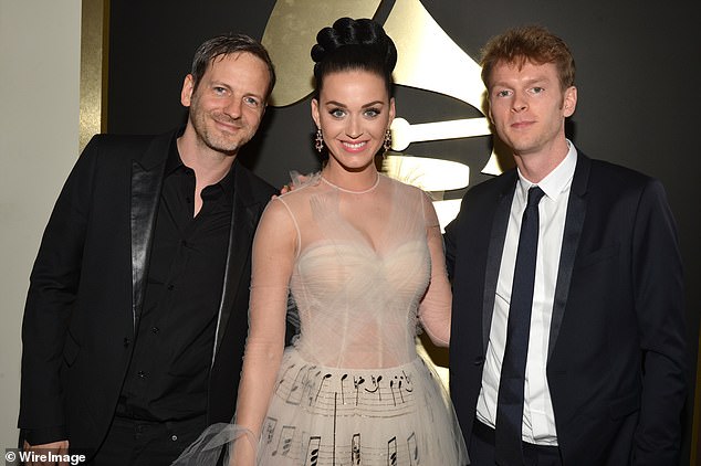 (L-R) Producer Dr. Luke, singer Katy Perry and producer Cirkut at the 56th GRAMMY Awards in 2014. Perry was convicted for collaborating with Luke on her new single