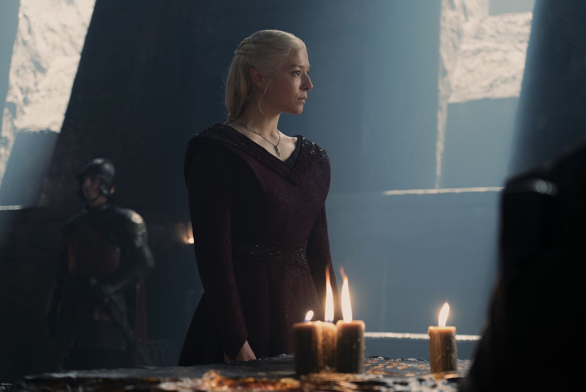 Rhaenyra stands at her war table as light fills the darkness from the windows in season 2 of House of the Dragon