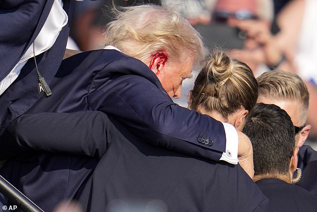 The Secret Service swarmed around the 45th US President as piercing screams could be heard from the MAGA crowd