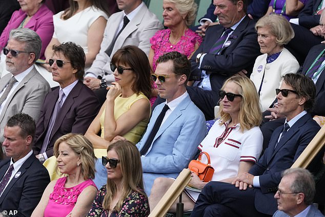 Julia's boyfriend Tom Cruise sat just three seats away from the beauty