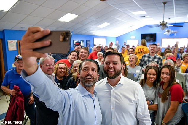 Vance has become close to Donald Trump Jr., who is seen here campaigning with him in 2022