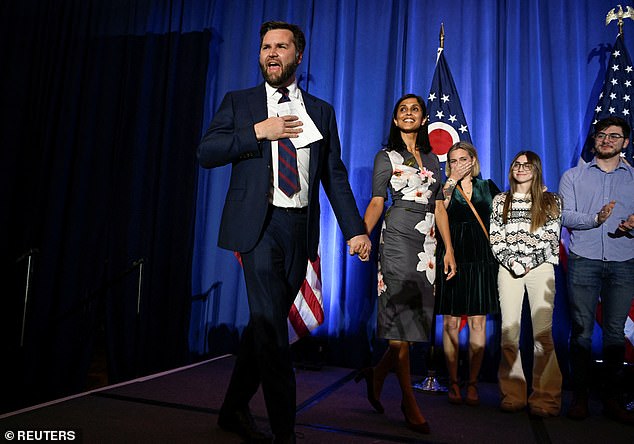 Usha Chilukuri Vance stands with her husband JD Vance as he arrives for his 2022 election night party after being declared the winner of the Ohio Senate race on November 8, 2022.