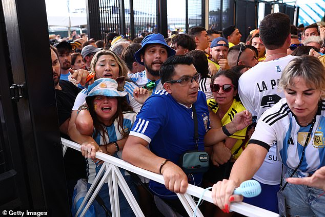 A crowd of fans were pushed against the entrance on Sunday as kick-off approached