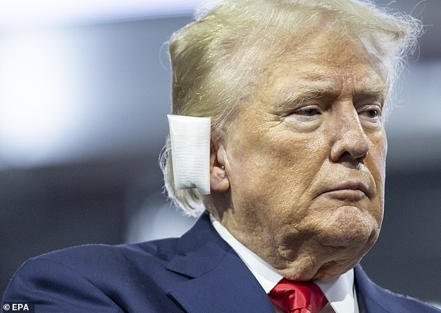 A bandaged Donald Trump arrives at the opening night of the RNC in Milwaukee