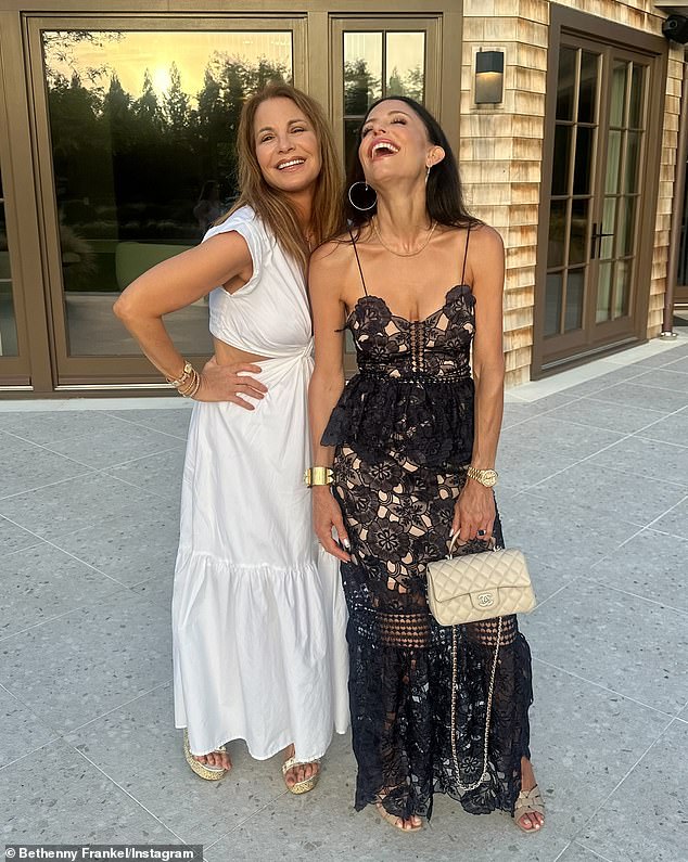 For their sunset dinner, Frankel wore a plunging maxi dress with sheer black lace and thin straps. She accessorized with gold jewelry, a cream Chanel bag, and taupe leather sandals