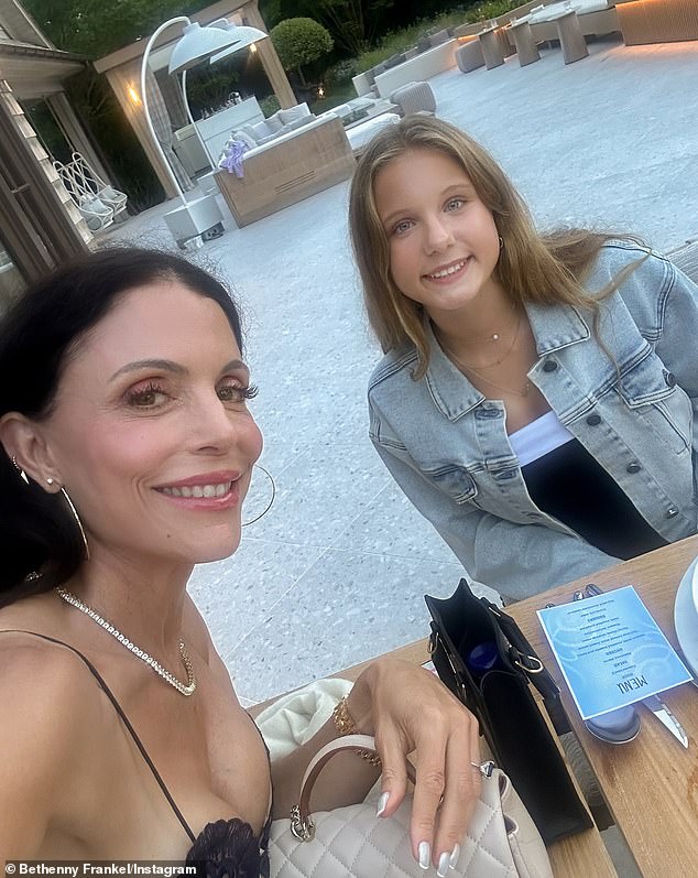 Frankel also snapped a selfie of her and her daughter Bryn, with their identical smiles, sitting at the dining table on the patio