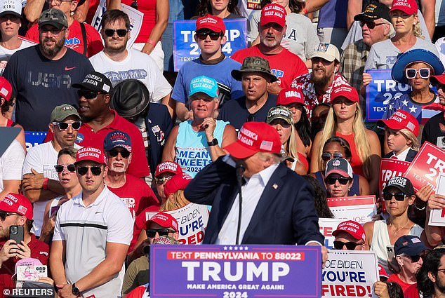 Trump clutched his right ear as the first shots rang out at 6:12 p.m.