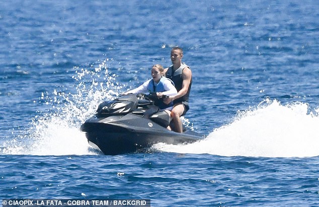 The family gathered to celebrate Harper's 13th birthday, with Romeo taking her on a jet ski ride during the family vacation