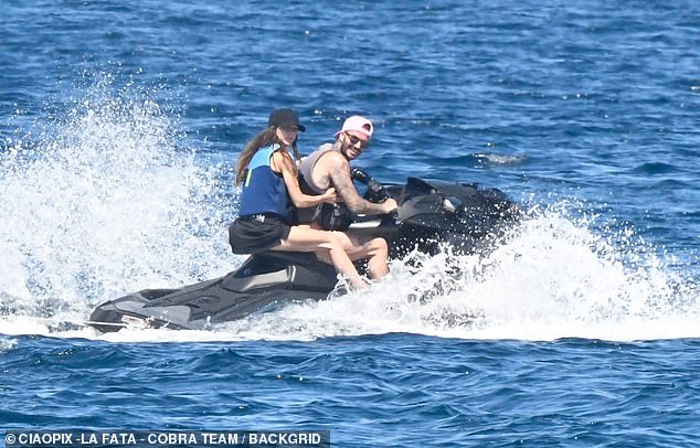 Victoria wore a black swim skirt with her life jacket and accessorized with a baseball cap as she enjoyed the ride